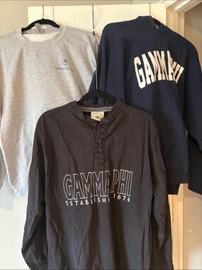 Gamma Phi Beta:
BlackLong-Sleeve Henley Tee -
Navy blue hoodie 
Grey sweatshirt